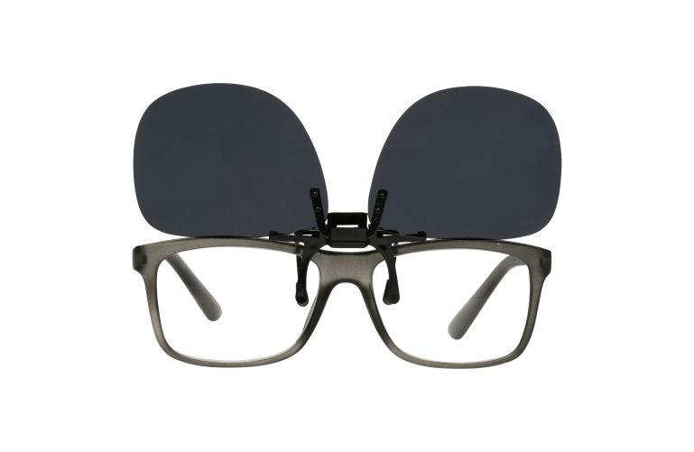clip on sunglasses shown in flip-up position attached to prescription glasses